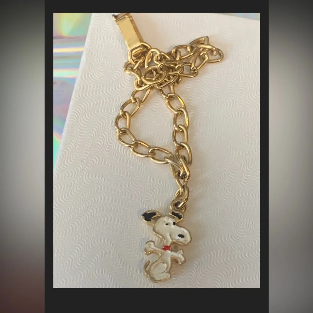 United features vintage gold tone 6” snoopy bracelet